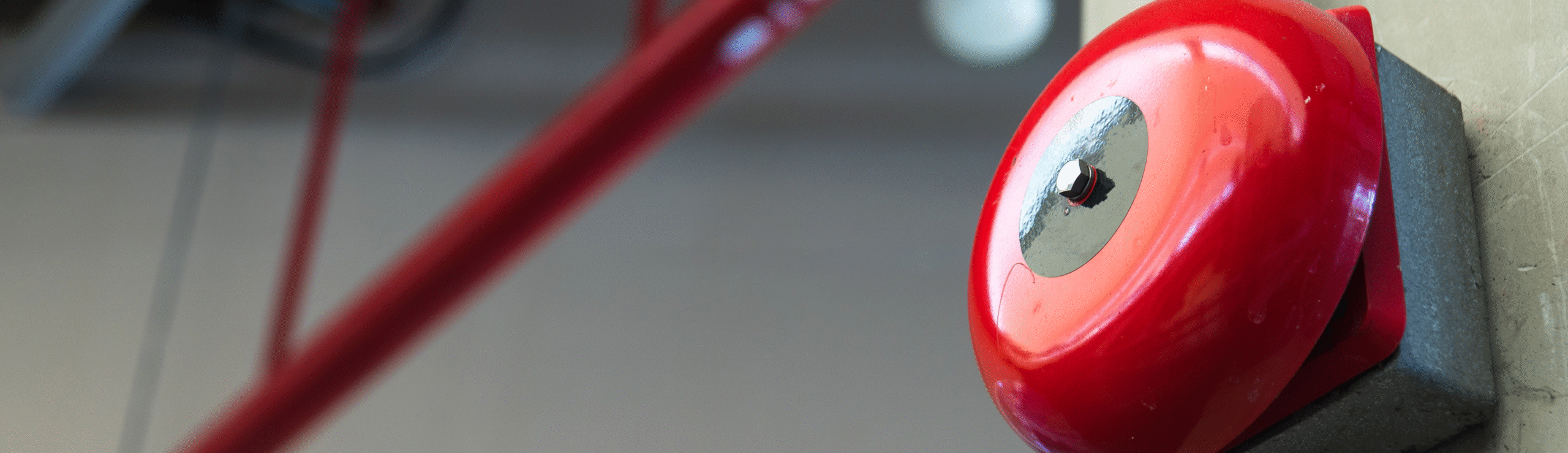 A close up image of a fire alarm bell