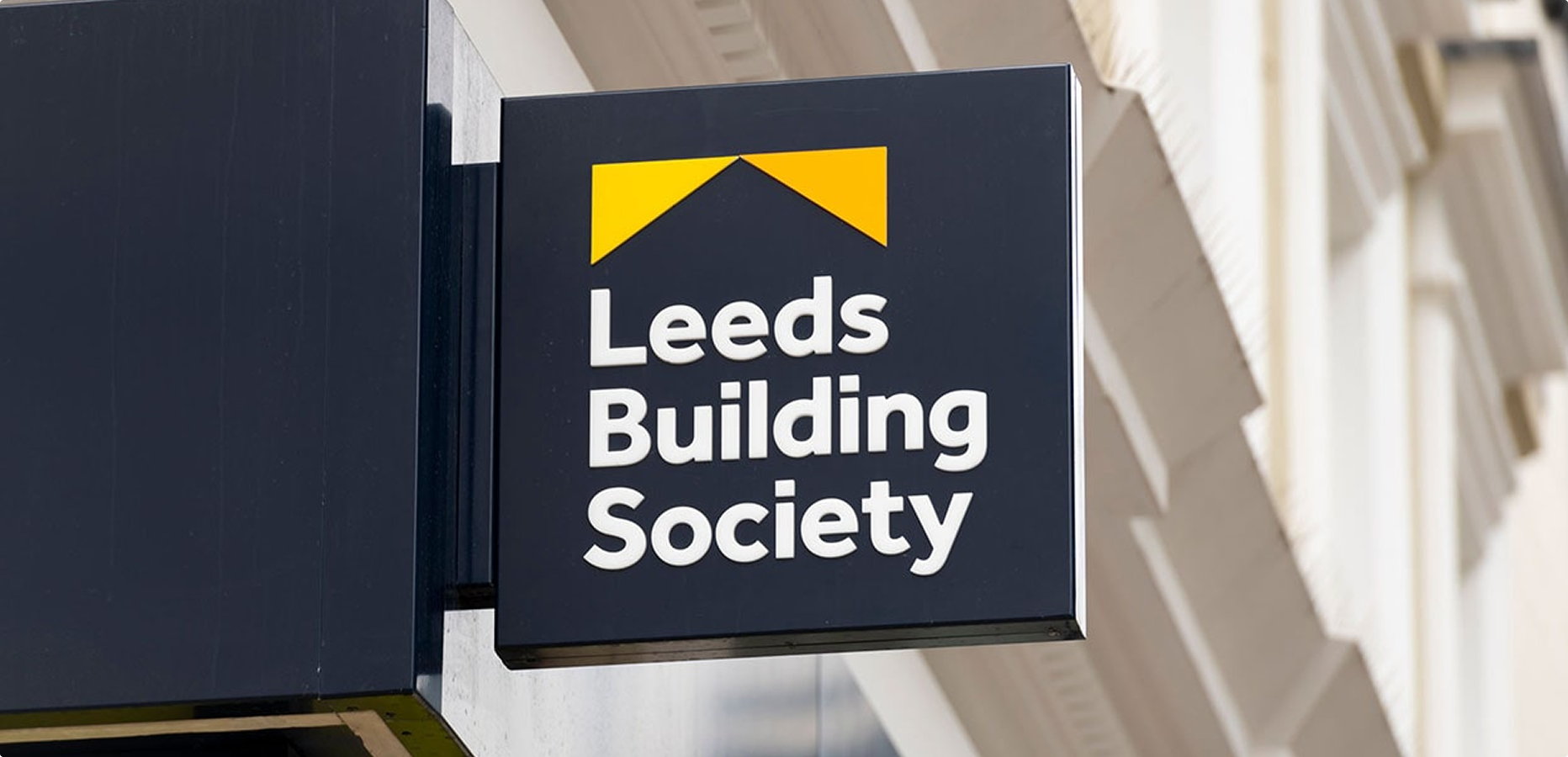 A sign with the logo of Leeds Building Society on it