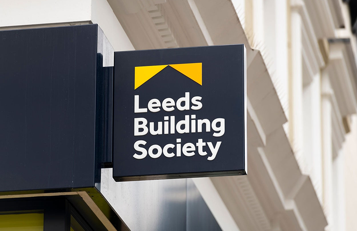 A sign with the logo of Leeds Building Society on it