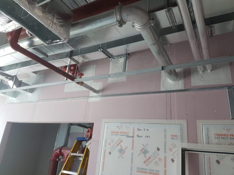 Passive fire protection installation protecting compartmentation in industrial buildings